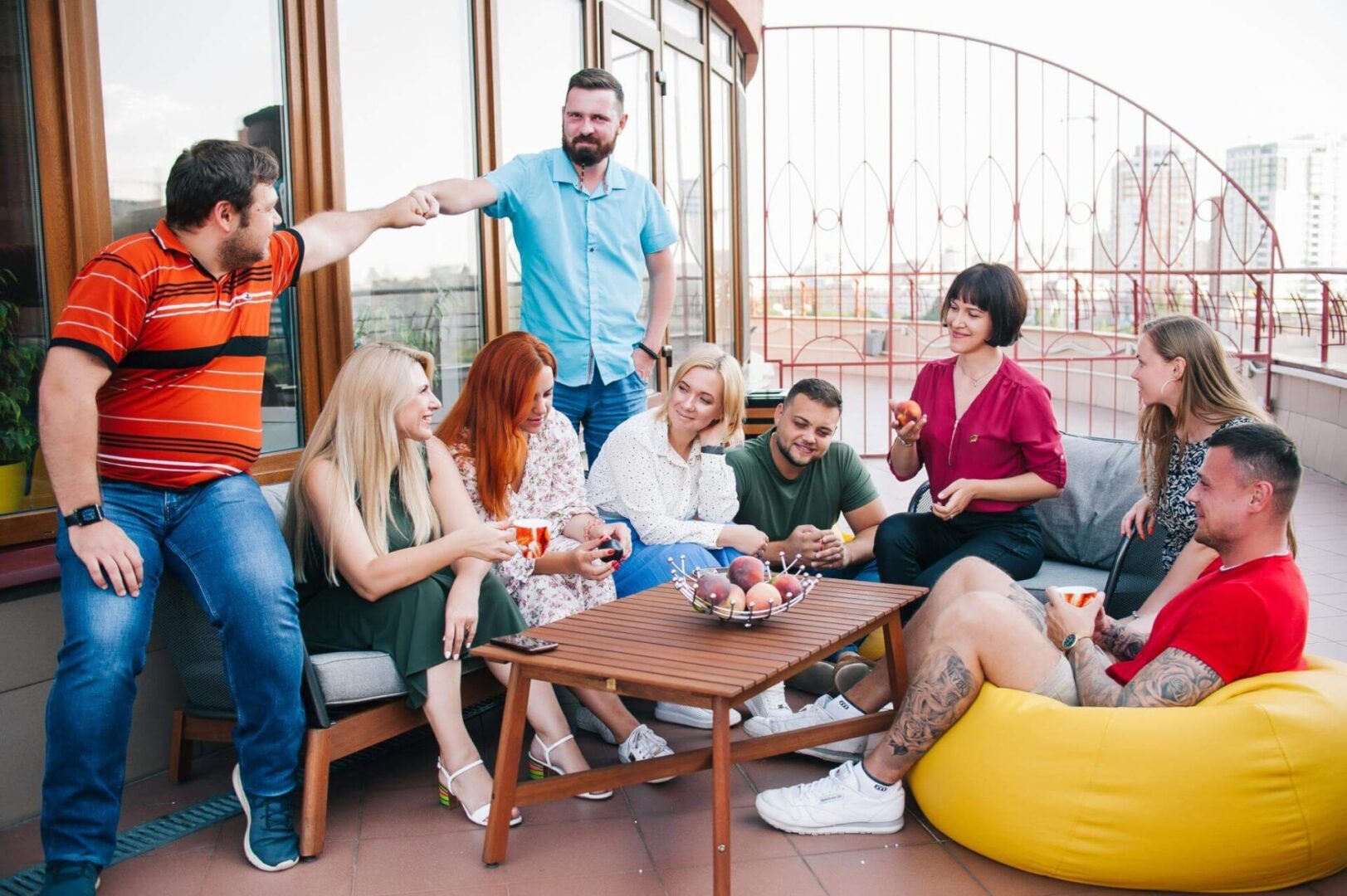 MaxBill team chills on the balcony of the Odessa office